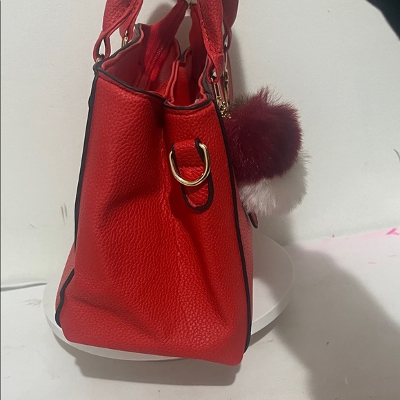 Elegant Red Handbag with Pom-Pom Charm - Picture 3 of 5